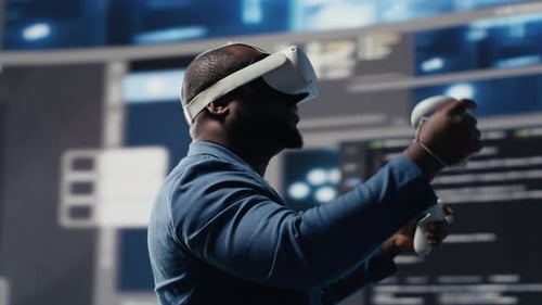 Digital Tech Expert Coding and Using VR Headset at Innovation Hub