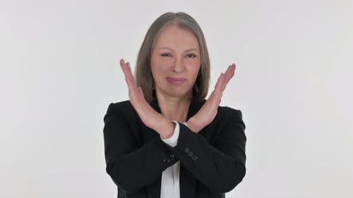 Mature Woman Gestures No with Arms on White