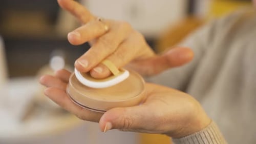 Cosmetic Foundation Application with Puff