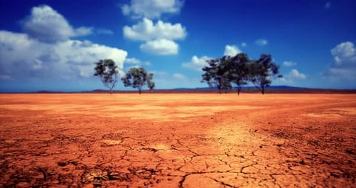 Time-Lapse of Dry Cracked Earth and Moving Clouds