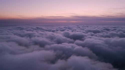 Scenic Aerial View of Clouds During Sunset