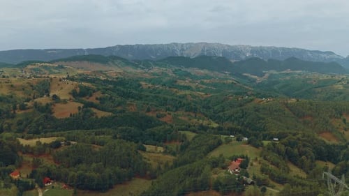 A Breathtaking Mountain Landscape Adorned with Lush Green Hills and Vibrant Nature That Inspires