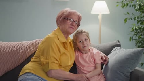 Grandmother and Grandchild Bonding on the Couch