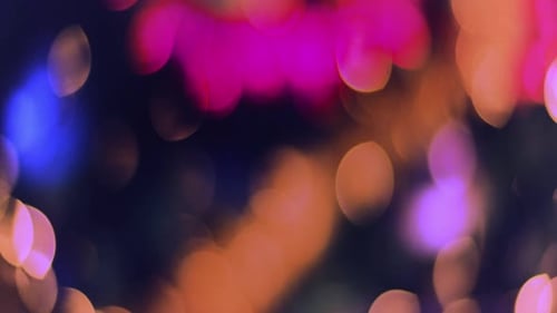Les lumières bokeh colorées brillent de mille feux