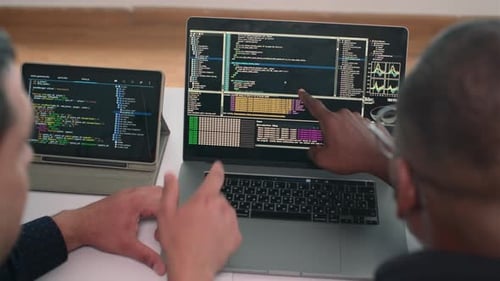 Two Developers Collaborate on Code Review