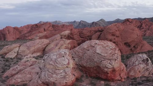 Aerial drone point of interest shot of big red sandstone boulders in Nevada