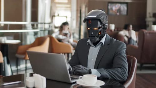 Robot Working On Laptop In Cafe