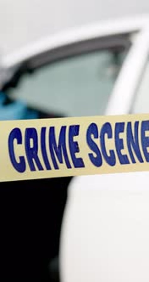 Crime Scene Police Tape at Car