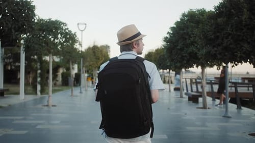 Happy Tourist Man Walking to Airport Terminal
