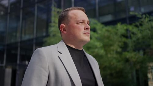 Businessman in a Gray Suit in the Office Business Concept