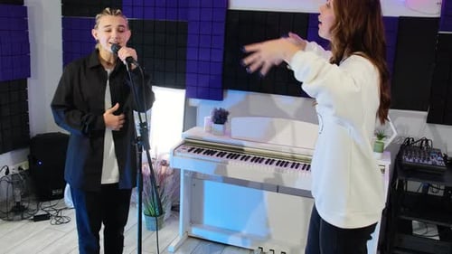 Teacher Controls Student Performance in Music Studio