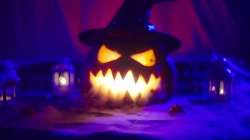 Eerie Halloween Pumpkin with Witch Hat and Fog