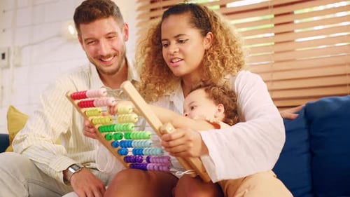 African family spend leisure time with baby gir in bedroom at house.