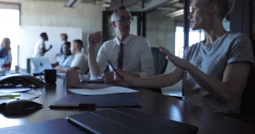 Business people discussing plans and strategy during a meeting in the office