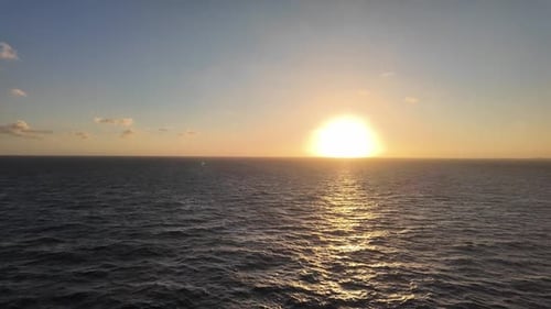 Beautiful Sunset Over Calm Ocean Waves Golden Sunlight Reflecting on Sea Surface Peaceful Evening