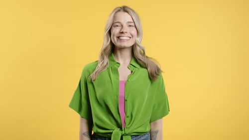 Young Woman Smiling in Studio