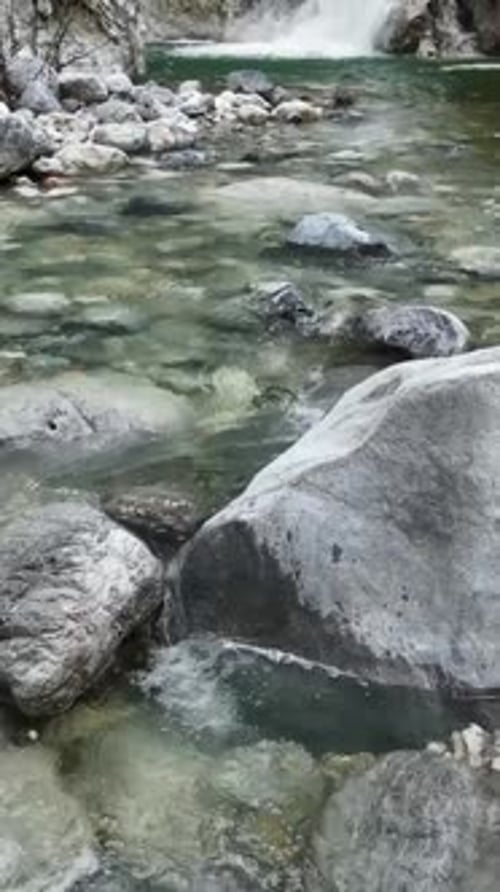 Vertical Video Aerial Reflections Serene Winter Mountain Forest with River and Cascades