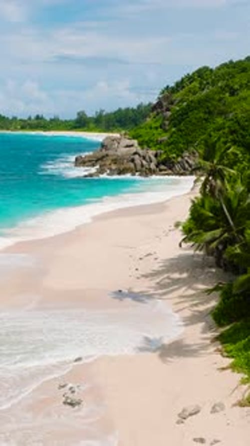 Azure Ocean and White Sand Beach with Tropical Vegetation Seychelles Mahe