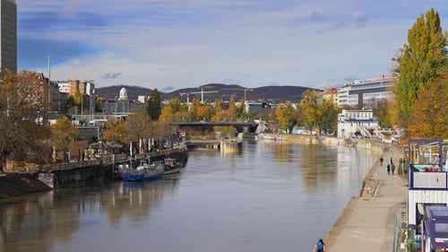Moving over the Danube Canal waterfront, Donaukanal, in downtown Vienna, Austria