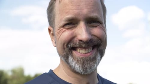 Smiling Mature Man Close Up Portrait Outdoors
