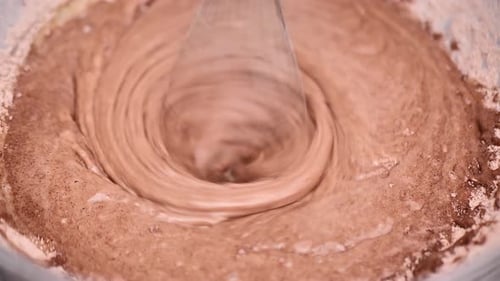 Batter Being Mixed in Glass Bowl with Whisk