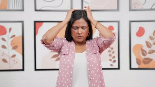 Modern Indian woman having head ache