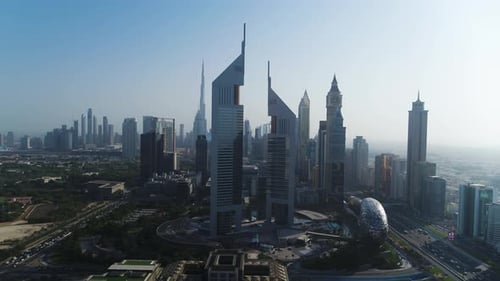 Aerial view of modern Dubai skyline at sunset, United Arab Emirates.