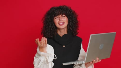 Frustrated Woman Using Laptop Computer