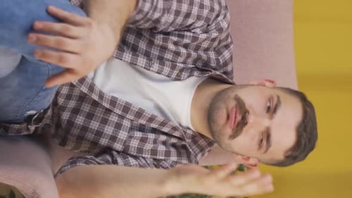 Vertical video of Stressed man.