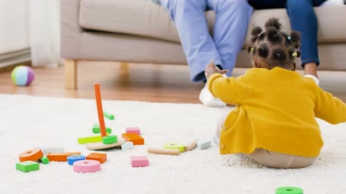 Adorable Baby Plays with Colorful Wooden Toys at Home