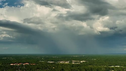 Dark Stormy Clouds Forming on Gloomy Sky Before Heavy Rainfall Over Suburban Town Area