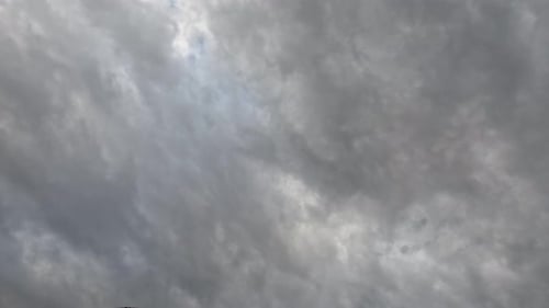 Dark Gray Clouds Drifting Slowly Across the Sky