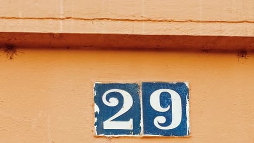 Number 29 (twenty-nine) Affixed to a Building