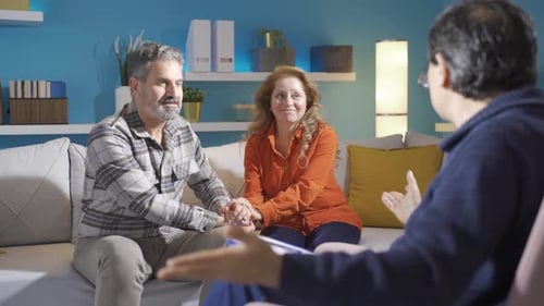 Couple in Therapy with Counselor at Home