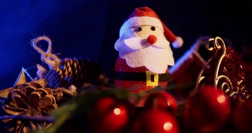 Christmas Still Life with Santa Figurine and Decorations