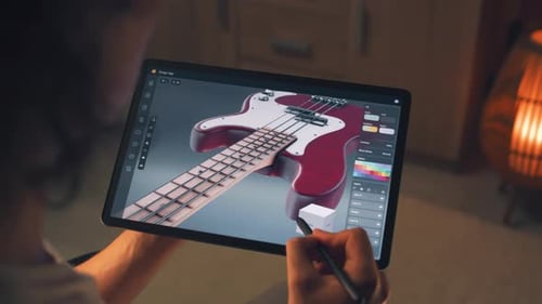 Designer Making 3D Prototype of Guitar