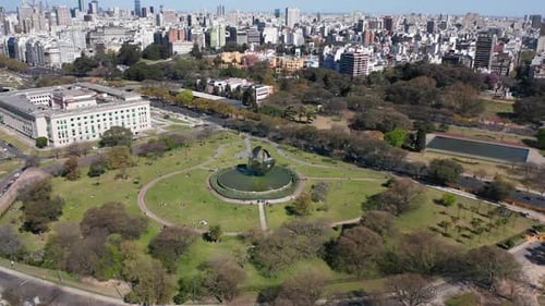 An aerial view of Floralis Generica - an aluminium and steel sculpture of a flower based above a poo