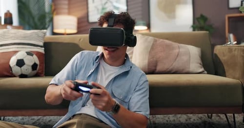 Young Adult Playing VR Game at Home