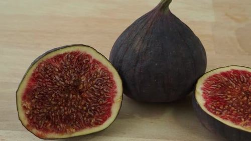 Ripe Figs on a Wood Surface