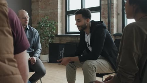 Adults in Group Therapy Session Indoors