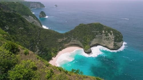 Breathtaking tropical Kelingking Beach Nusa Penida Island Bali. Scenery lagoon, sand shoreline and m