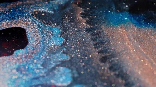 Dynamic Video of Colorful Substances Mixing and Creating Vibrant Patterns