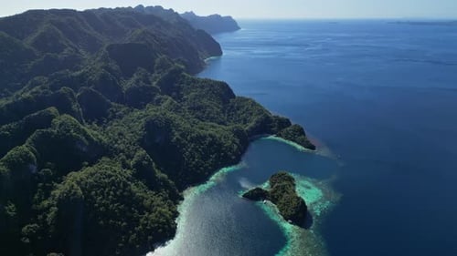 Tropical Island with Beach Rocks Coral Reef