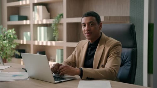 Smiling Businessman African American Man Male Entrepreneur Business Leader Software Engineer Typing