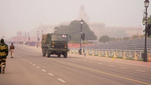 City Street with Military Vehicle and People