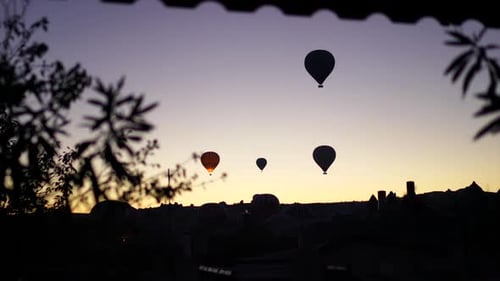 hot air balloons rising over the Cappadocia, Turkey during sunrise