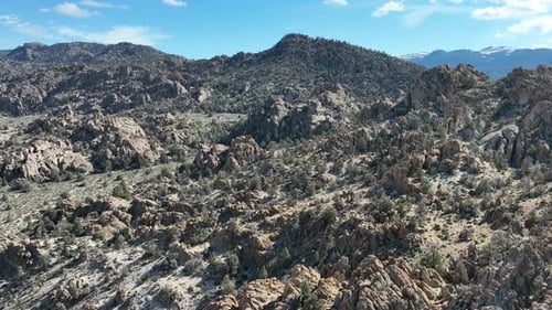 Aerial shot of interesting rock formations in the desert of California