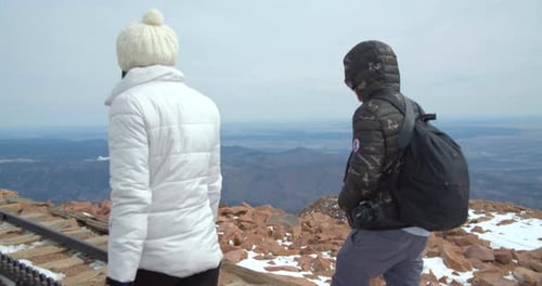Hiking train tracks above the Colorado rocky mountains adventure