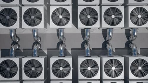 Array of HVAC Units on a Rooftop of a Modern Building
