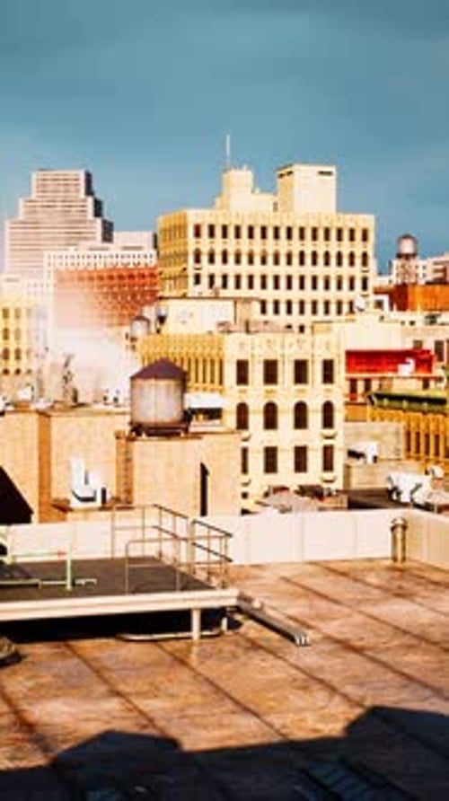 The Cityscape Taken From a Rooftop with Steam Rising in the Foreground